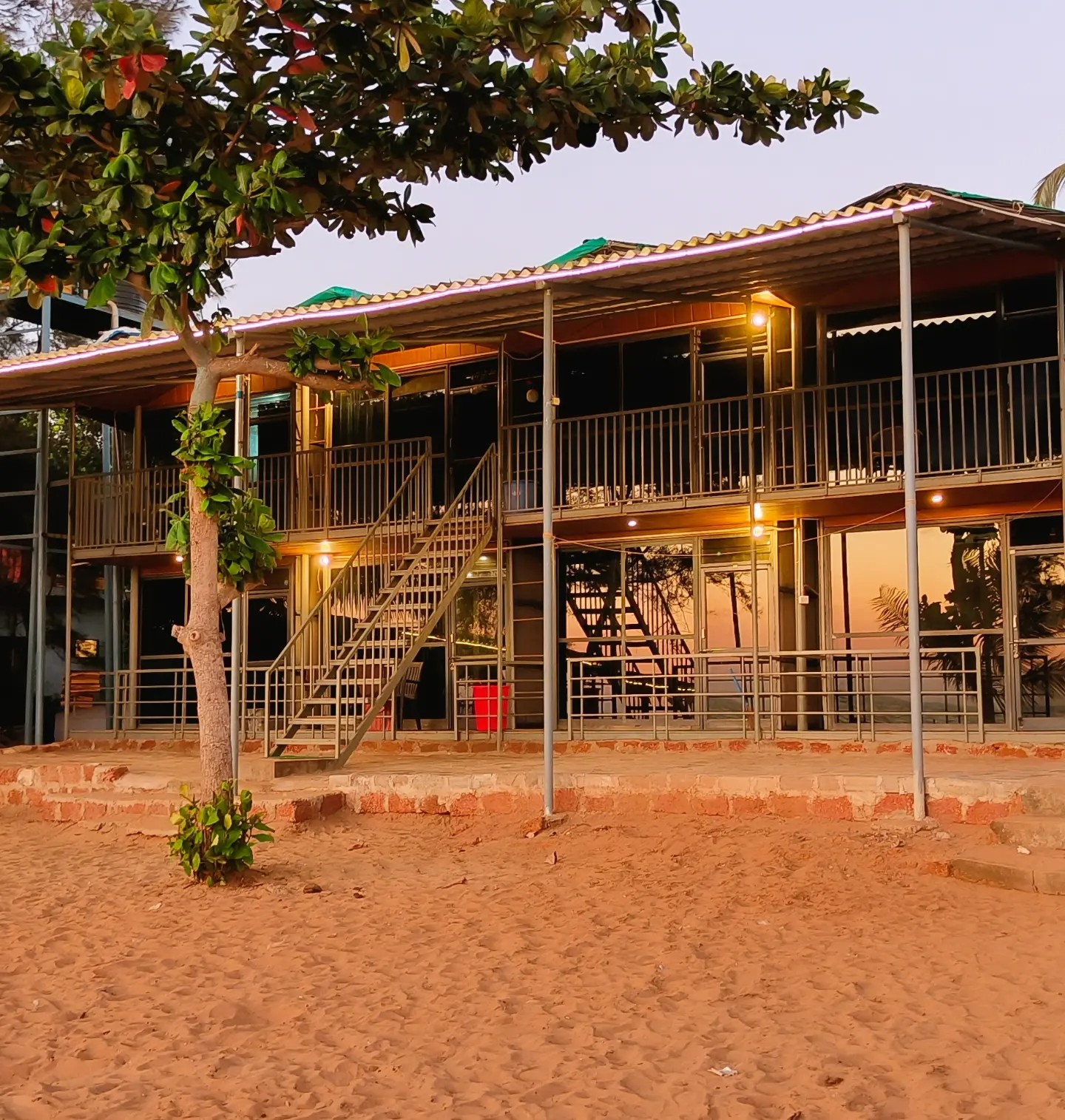 R K Beach Cottage exterior by the beach